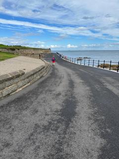 Walking round the point and now starting to head west
